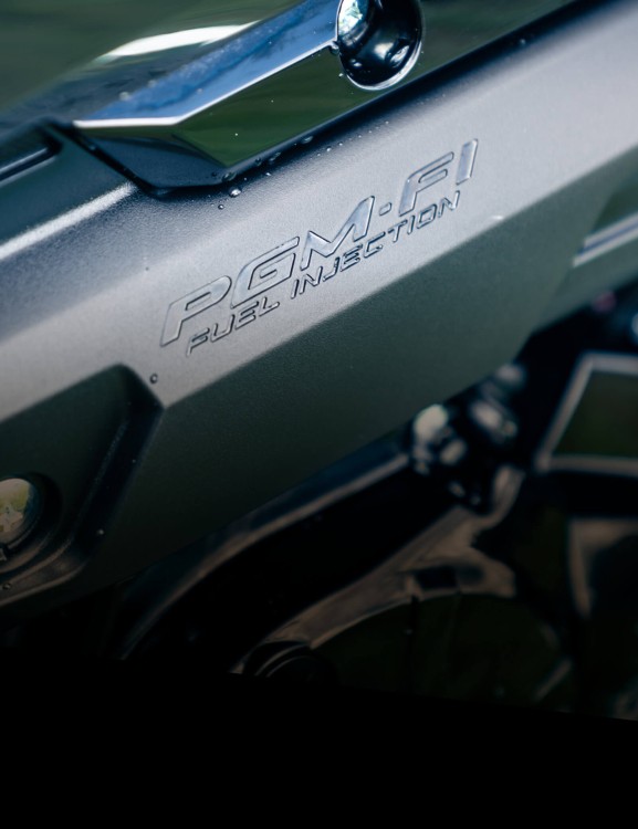 Programmed Fuel Injection (PGM-FI) Programmed Fuel Injection (PGM-FI)